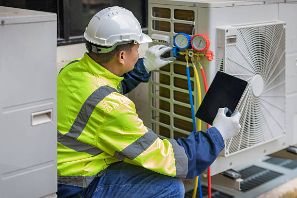 Professional Air Duct Cleaning technician working in San Diego, CA